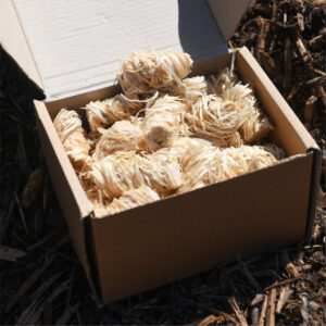 Cardboard box of natural wood wool firelighters